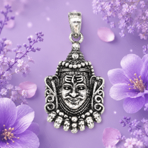 Antique silver deity pendant